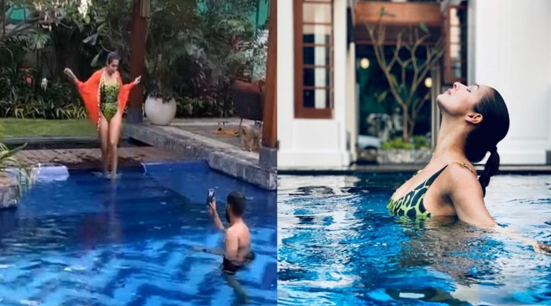 Malaika Arora in the swimming pool and her boyfriend Arjun Kapoor is taking pictures