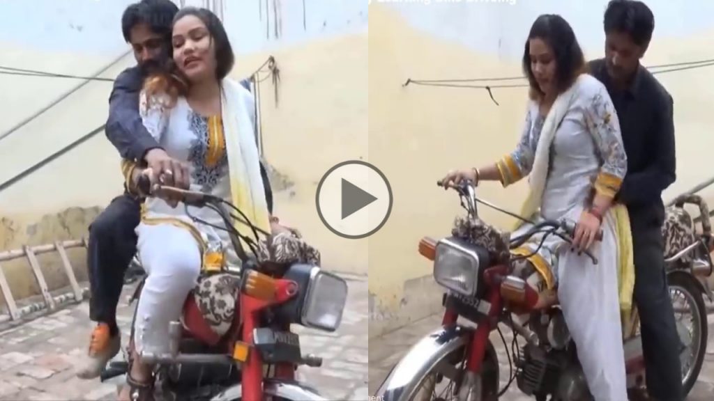 viral video this guy does this with the girl in bike